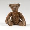 German, ca. 1910, Steiff teddy bear in cinnamon color with mohair, extra-large back hump, and original eyes and nose