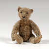 A Steiff Tan Teddy Bear with Shoe Button Eyes