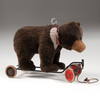 A Steiff Teddy Bear on Wheels Ride On Pull Toy