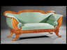 A Biedermeier carved figured maple settee, 19th century