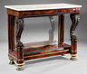 An American Classical carved, ebonized and gilded mahogany pier table, circa 1825, attributed to Anthony G. Quervelle, Philadelphia