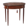 A Louis XVI-style mahogany and marble-top gueridon table, circa 1900