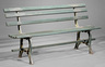 A New Orleans painted wood and cast-iron garden bench, late 19th/early 20th century, foundry mark of Hinderer's Iron Works, New Orleans