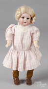 An Armand Marseille 390 bisque-head child doll, with brown glass sleep eyes, open mouth with upper teeth, blonde mohair wig