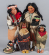 A grouping of five Skookum Native American Indian dolls