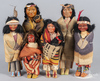 A grouping of six Skookum Native American Indian dolls