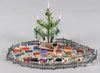 A miniature dollhouse Christmas garden with feather tree, die cast fencing, wood houses and animals