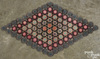 A Pennsylvania tabletop penny rug, 19th century