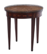 A Louis XVI-style inlaid mahogany gueridon, late 19th century