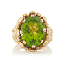 PERIDOT, WHITE OR YELLOW DIAMOND RING, oval-faceted peridot, within substantial RBC white or yellow diamond pave