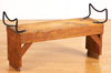 A pine bench form wagon seat with iron handles